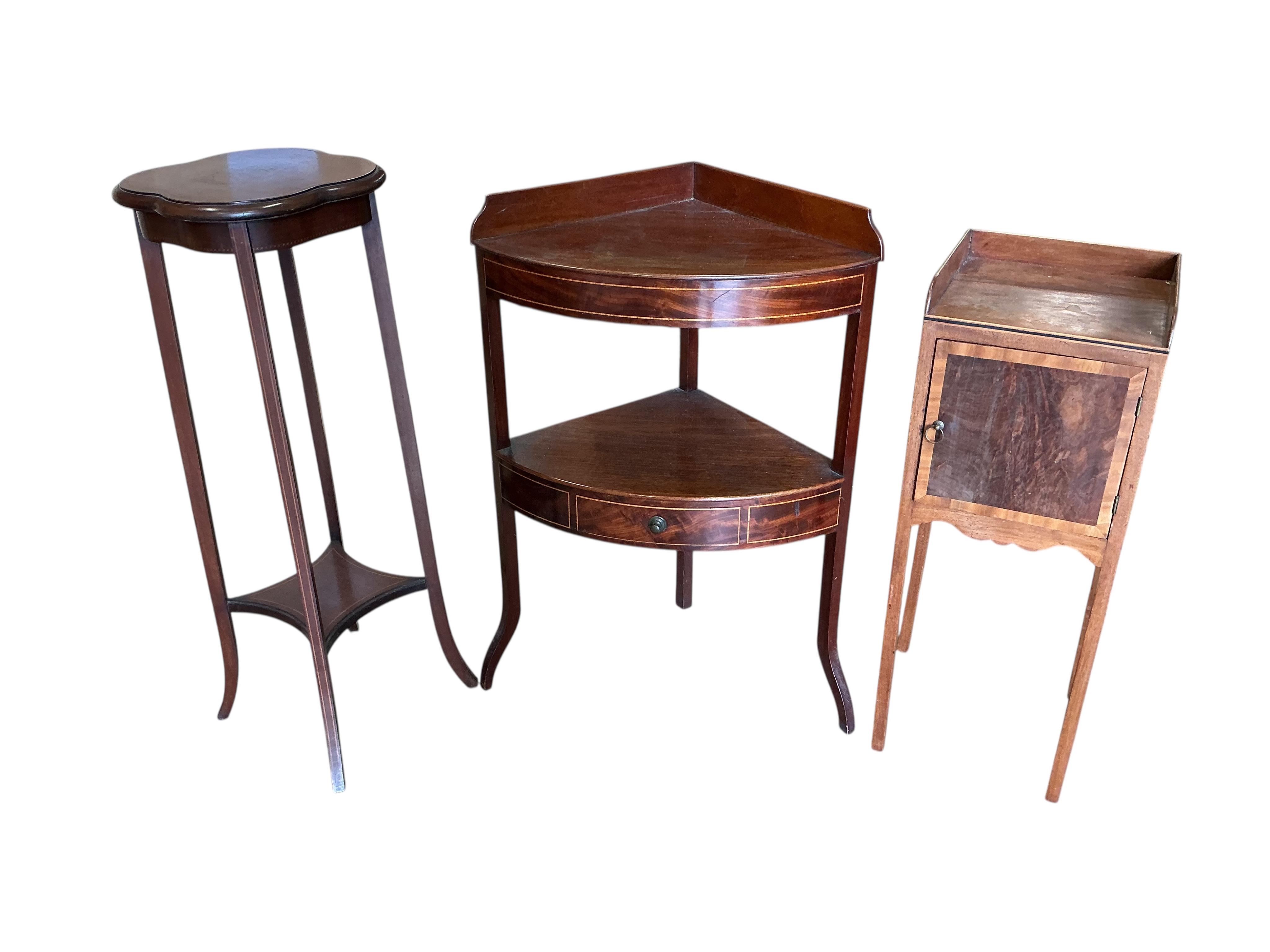 A George III mahogany bow front corner washstand, pot cupboard and an Edwardian plant stand